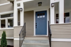 Houseexterior.Viewofentranceporchwithstaircase